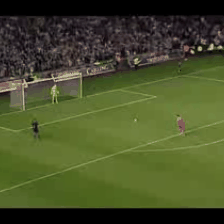 Input clip: a soccer penalty kick with a goalkeeper diving, the ball in flight, and the kicker running.